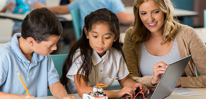 Teacher with students